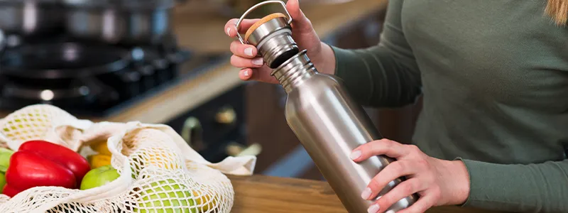 Reusable bottle with fruit diffuser to increase water intake.