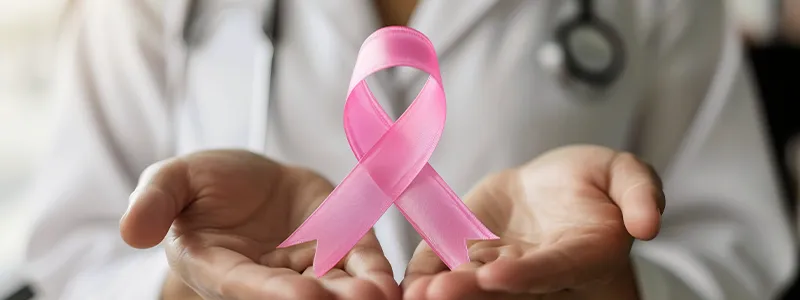 Breast cancer prevention campaign, doctor needs pink ribbon