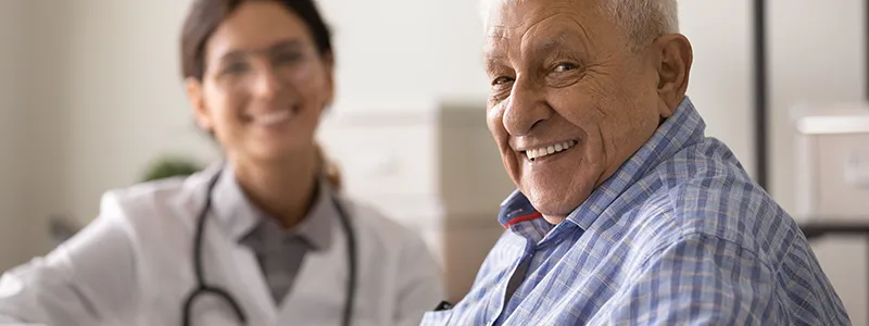 Adult undergoing blood pressure check in a clinical setting